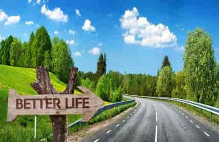 Easy and enjoyable money course for young adults-landscape of road and better life sign